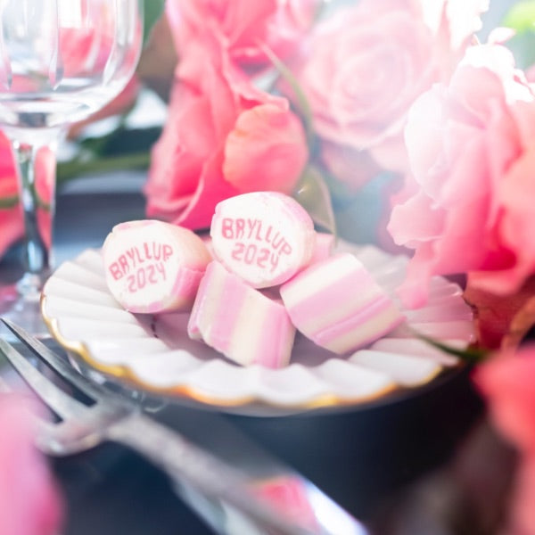 Hochzeitssüßigkeiten rosa Tischdekoration