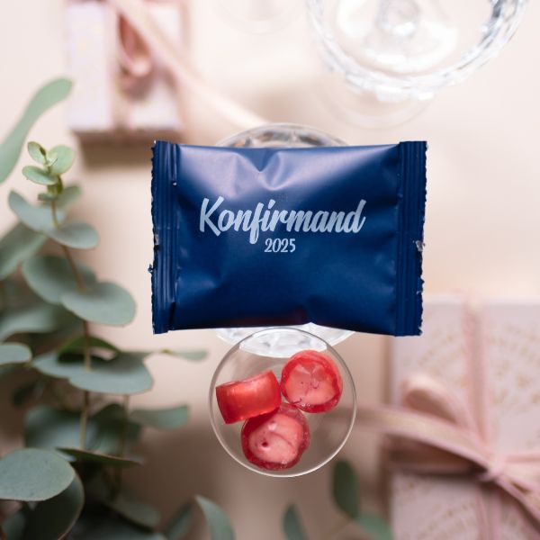 Blue CONFIRMATION BAGS WITH WHITE PRINT FILLED WITH HANDMADE BUNCHES: PERFECT TABLE DECORATIONS FOR CONFIRMATION