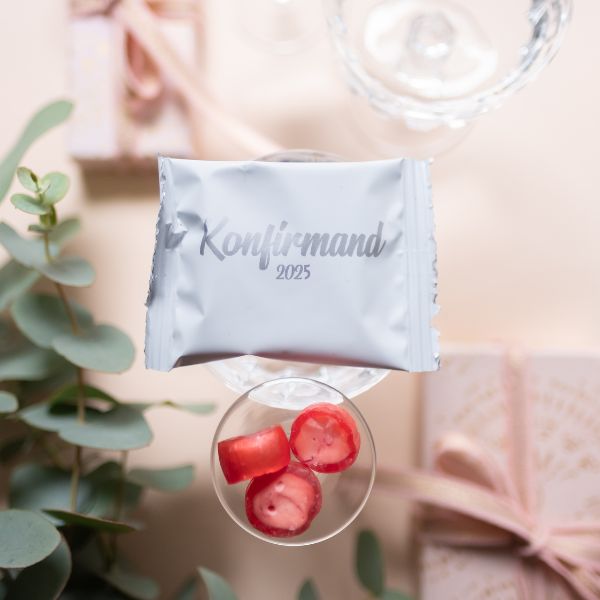 White Confirmation Bags with Silver Print Filled with Handmade Cookies: Perfect Table Decorations for Confirmation