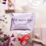 Navnepose & dato lyserød m. sort tryk inkl. bolcher