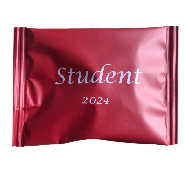 Rote Studententasche mit weißem Aufdruck inkl. Harte Süßigkeiten